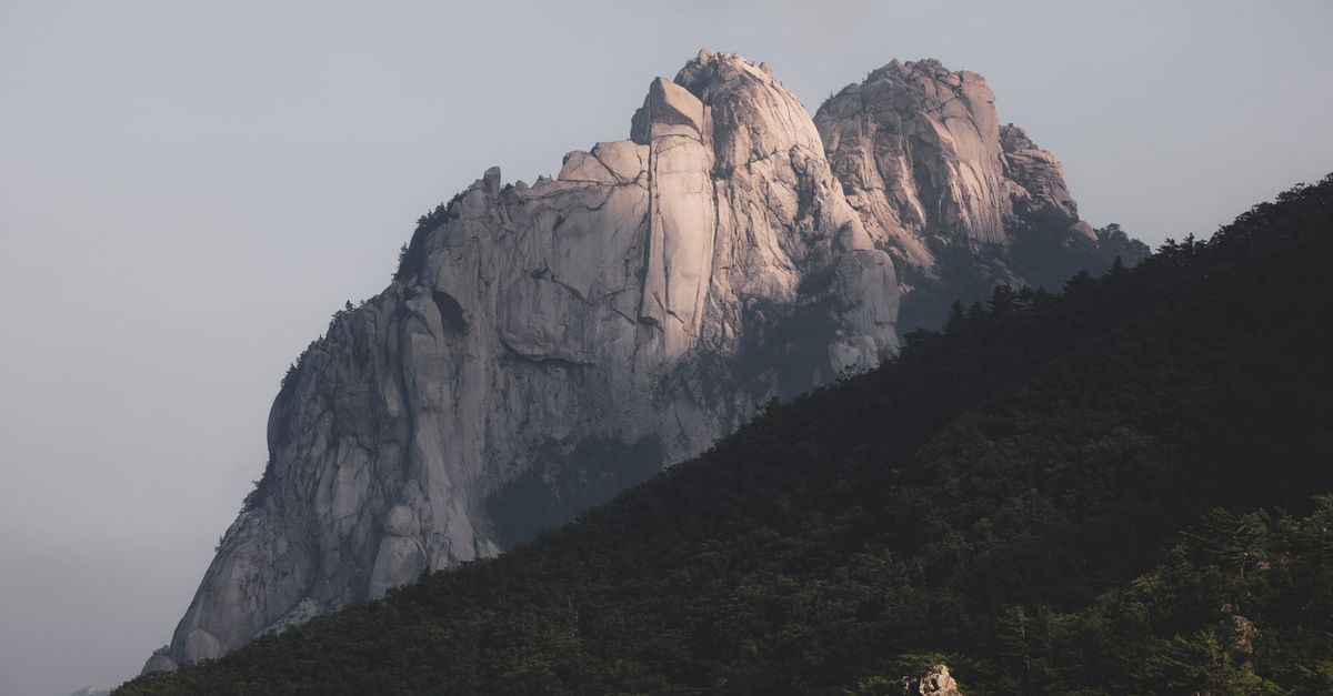 Ulsan travel guide: a quiet coastal city worth slowing down for Majestic Ulsanbawi rock formation in Seoraksan National Park, South Korea, under soft daylight.