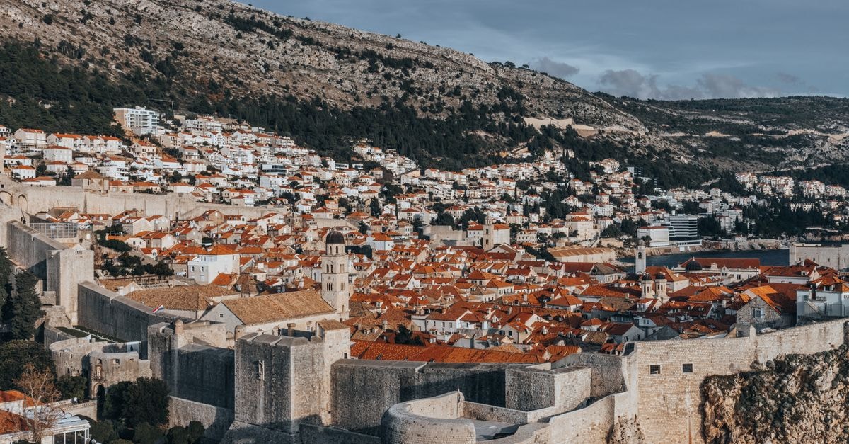 Stunning view of Dubrovnik's medieval Old Town with iconic red rooftops and historic fortifications.