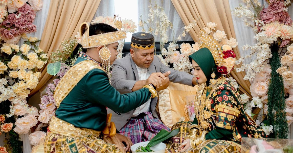 A vibrant traditional wedding ceremony in Kendari featuring cultural attire and rituals.