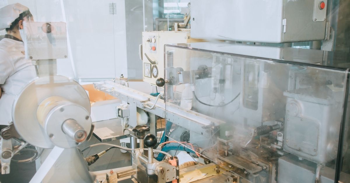 China nears DUV lithography mass production as ASML confronts new competitive pressure Close-up of advanced machinery in a modern laboratory setting, highlighting technology and industry.