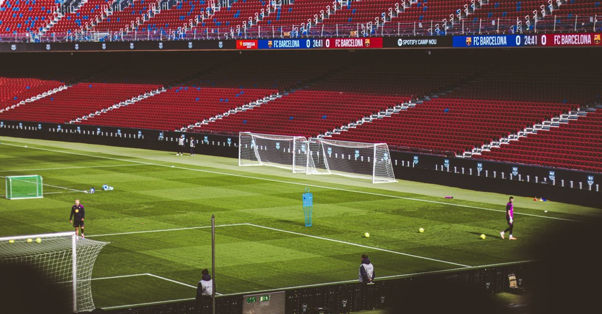 Klay Thompson signs two-year deal with Miami Heat after clearing waivers View of empty soccer field at FC Barcelona's Camp Nou with training equipment.