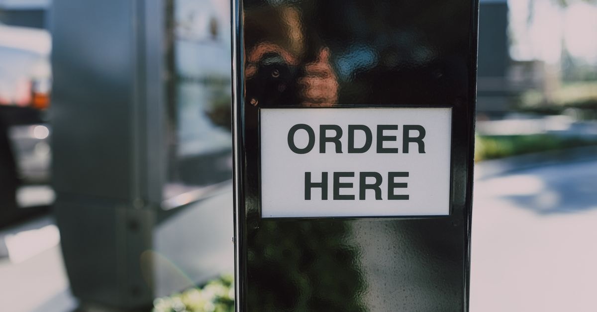 Vertiv expands EMEA thermal services through KES acquisition Close-up of an order sign at a drive-thru station, ideal for business contexts.