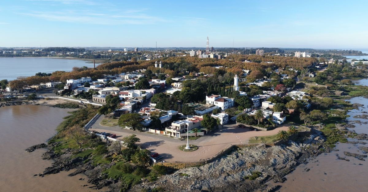 Gran Hotel Guaraní in Corrientes: A Riverside City Stay with Pool and Sauna A scenic aerial view of Colonia Del Sacramento's coastline capturing its historical charm and natural beauty.