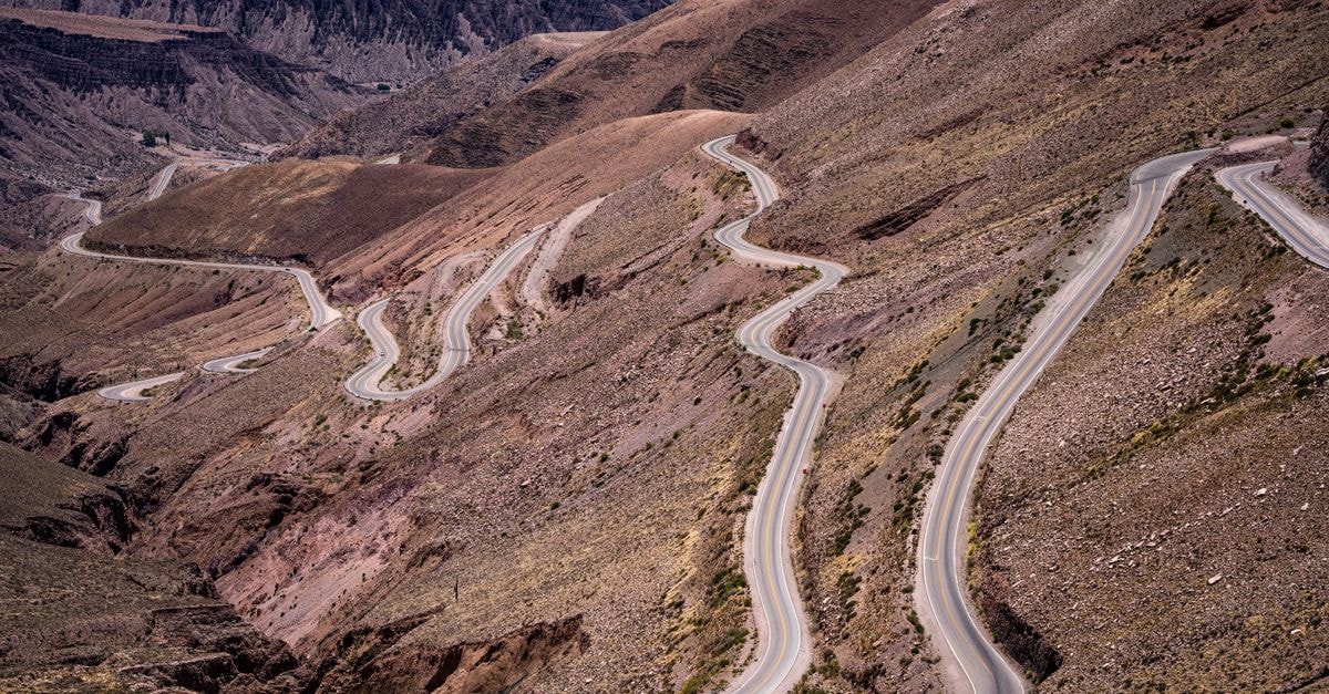 Scenic serpentine road weaving through the Andes Mountains in Argentina.