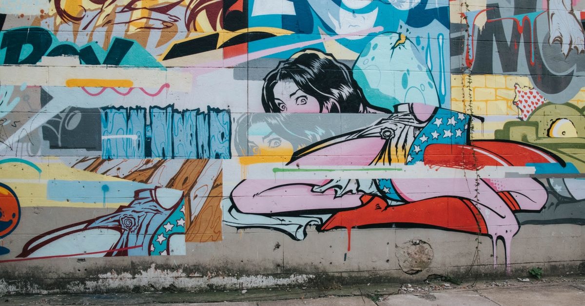 Wolverhampton Travel Guide: Pop Art, City Walks and Easy Arrivals Vibrant street art mural featuring comic style elements on a wall in Richmond, VA.