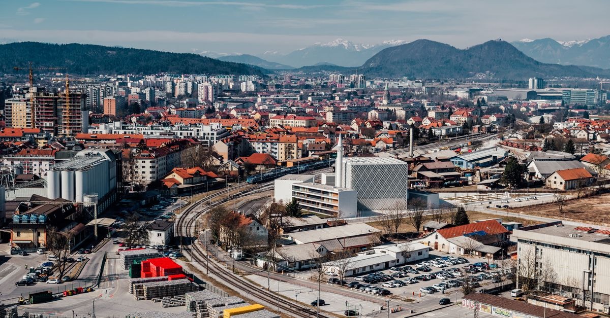 CŠOD Prvine near Trbovlje: A Forest School Hub in the Slovenian Hills Explore the vibrant cityscape of Ljubljana, Slovenia with this stunning aerial view featuring urban architecture and scenic mountains.
