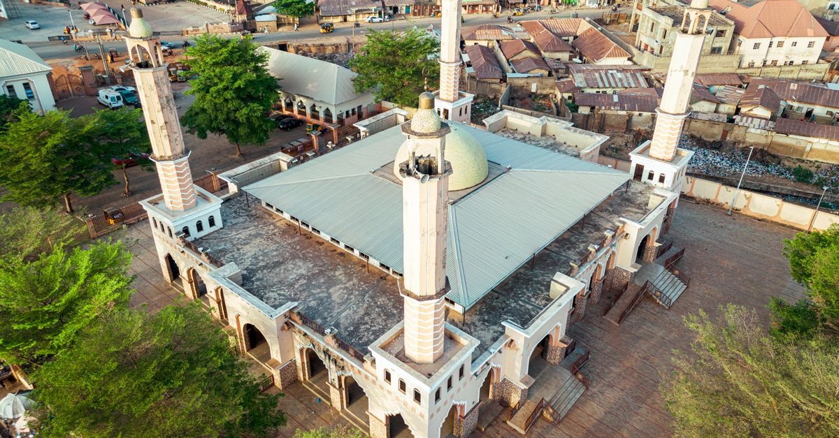 Katsina Motel in Katsina: A 1959 Guesthouse Turned Northern Hospitality Stop Stunning aerial view of a mosque in Kaduna, showcasing architectural beauty and surrounding area.