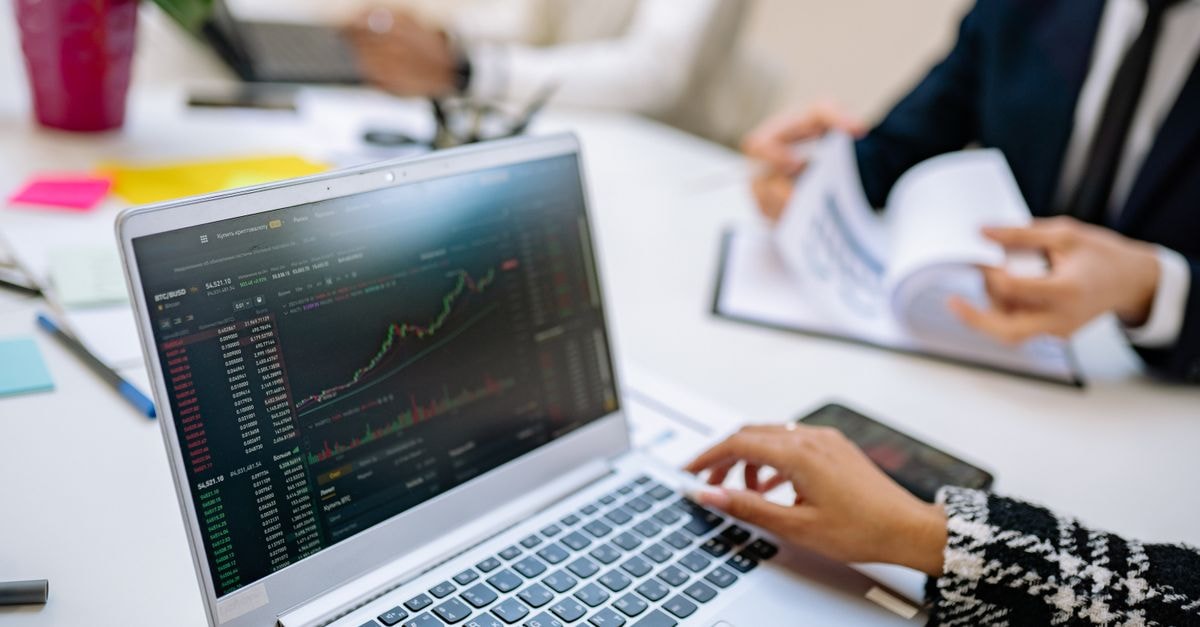 AVS Bio acquires UK bioreagent supplier Biorbyt to expand biomaterials catalog Business team analyzes cryptocurrency market trends using a laptop with graphs and data.