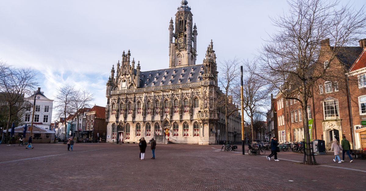 Stunning view of the Gothic-style City Hall located in Middelburg, Netherlands' main square.