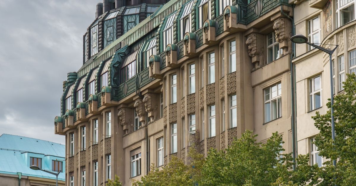 Hotel Deminka Palace, Prague: A Historic Stay in the City Center Detailed view of a historic Art Nouveau building facade in Prague, Czechia.