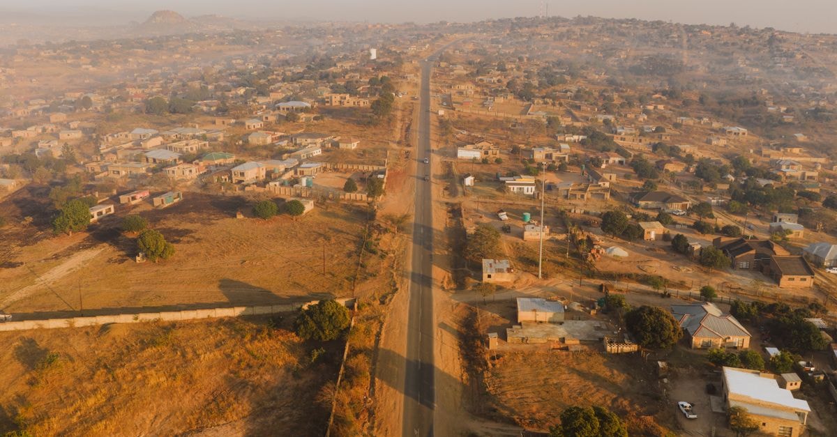 Holiday Inn Bulawayo, Bulawayo — International Comfort in the City of Kings Scenic aerial view of rural Numbi village in Mpumalanga, South Africa, at sunrise.