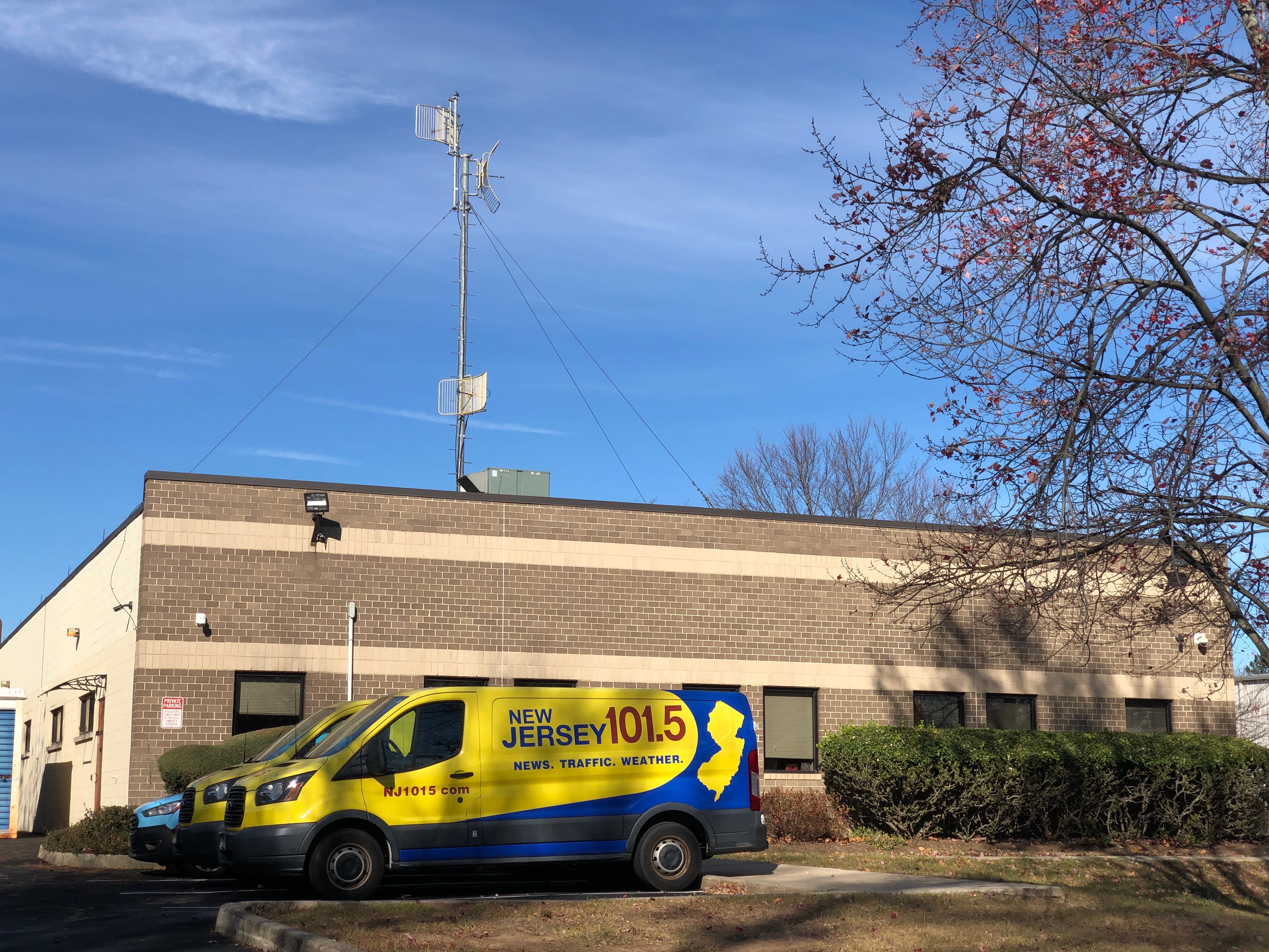 Townsquare Media: Levered Balance Sheet Collides With Declining Radio Cash Illustration for Townsquare Media: Levered Balance Sheet Collides With Declining Radio Cash: 2024-11-15 12 12 43 The Townsquare Media Trenton office with a van for New Jersey 101.5 in front in Ewing Township, Mercer County, New Jersey.jpg