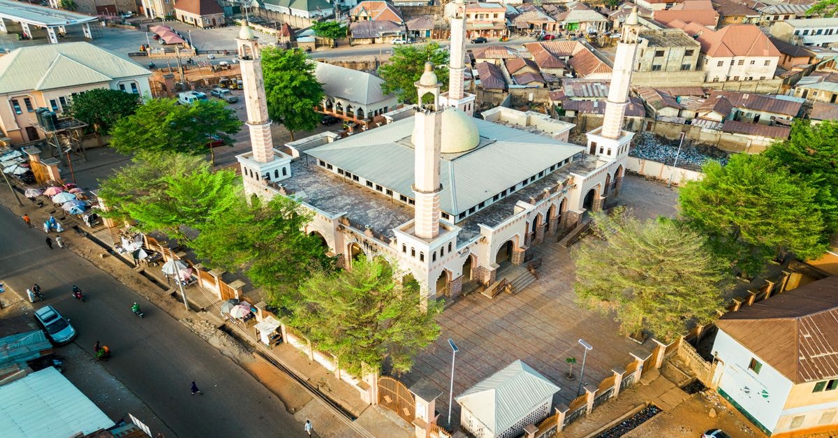 Lubumbashi Travel Guide: Practical Tips for Visiting the Copperbelt Capital Stunning aerial view of a historic mosque in Kaduna, showcasing unique architecture.