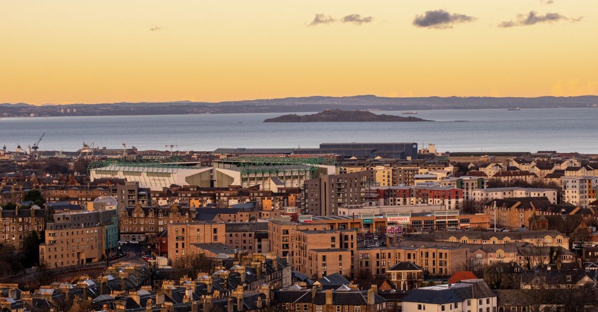 Travelodge Southend-on-Sea: A Chichester Road Stop on the Essex Coast Stunning aerial view of Edinburgh skyline with coastal backdrop at sunset, capturing urban and natural beauty.