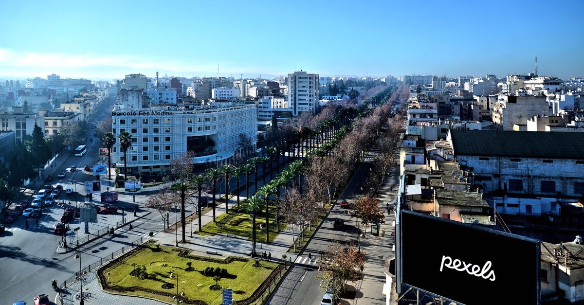 Hôtel Mercure in Bab Ezzouar: A Boulevard Address in Algiers Aerial view showcasing the cityscape of Fès, Morocco, with clear skies and vibrant urban layout.