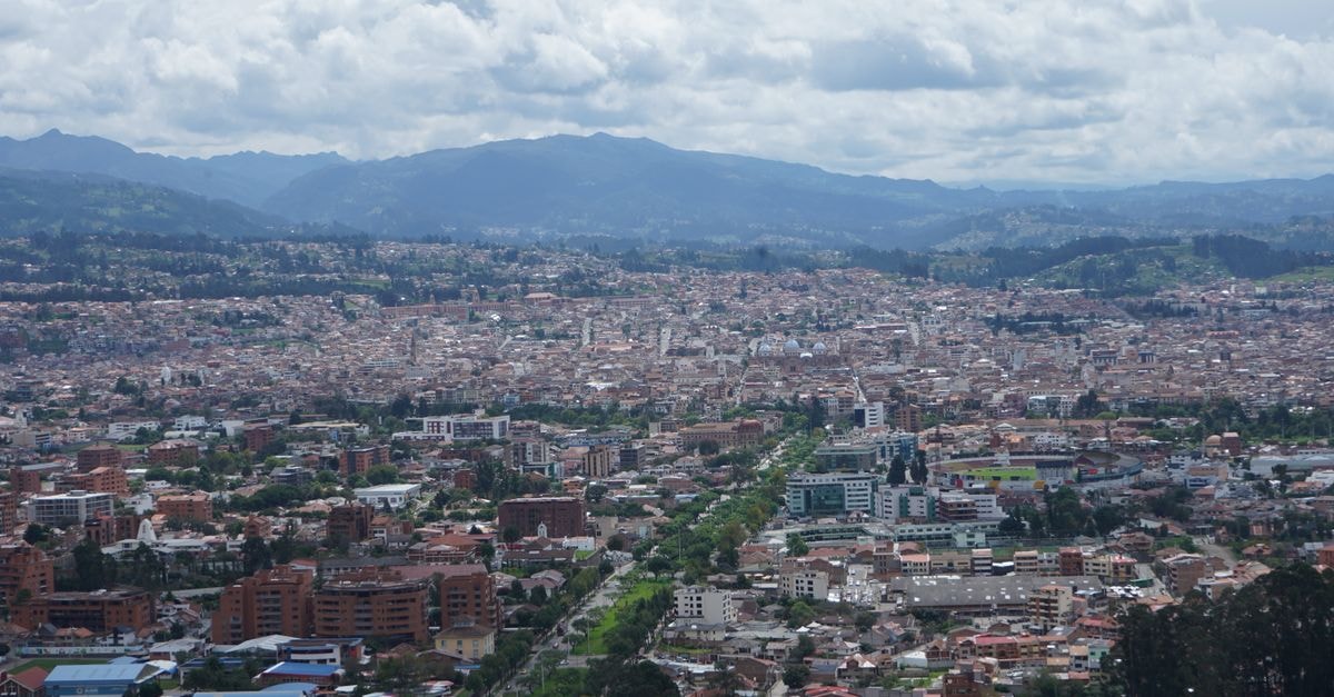 Só Love Hotel, Diadema — Four Suite Categories and a Hydro-Equipped VIP Stunning aerial view of Cuenca, Ecuador showcasing its dense urban landscape and mountainous backdrop.