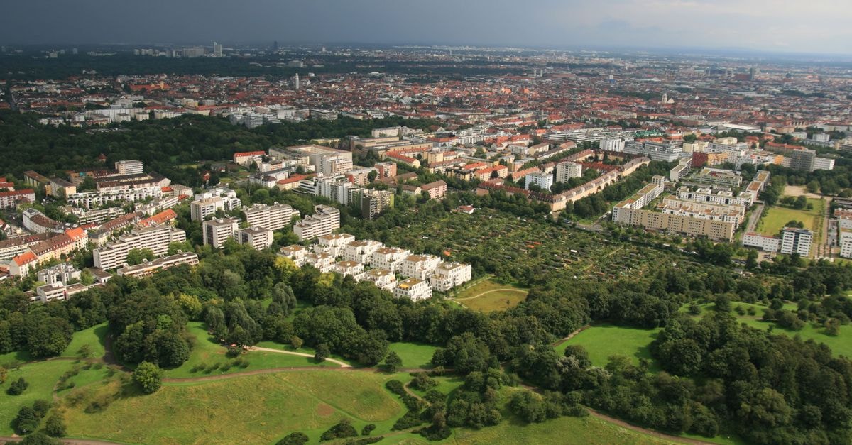 Hotel Vier Jahreszeiten Kempinski München in Munich: Royal Bavarian Flair on Maximilianstraße Stunning aerial view of Munich showing the city's urban landscape and green parks.