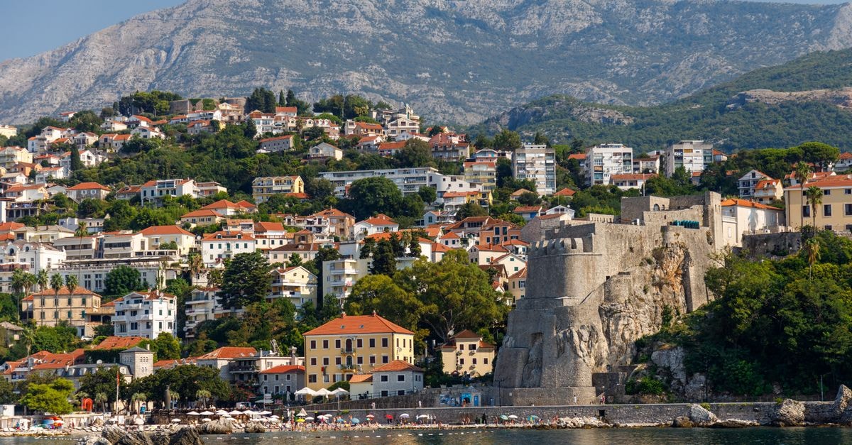 Beautiful landscape of Herceg Novi with historic fortress and coastal mountain backdrop in Montenegro