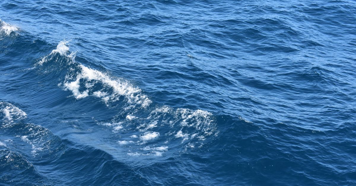Japan reports multiple rare earth element finds in Pacific deep-water mining Close-up view of dynamic ocean waves and blue sea with white caps on a sunny day.