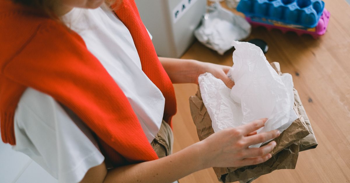 Ponda gains £2.35M UK grant to scale BioPuff bulrush insulation; Nature Food study finds food-waste recycling could cut US agricultural climate impact 89–99% Crop anonymous female in casual clothes sorting out rubbish while standing in light apartment in daytime