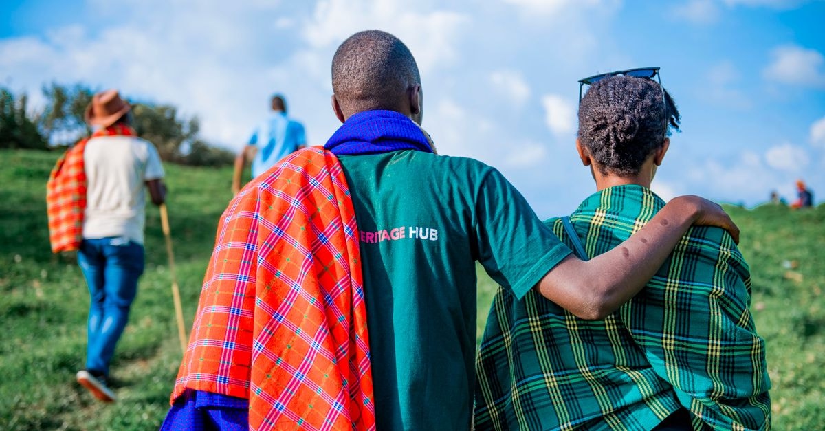 Gitega travel guide: heritage, hills, and Burundian flavor Group of friends enjoying a scenic hike in the summer outdoors.