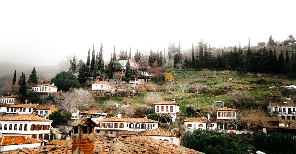Discover the rustic charm and scenic beauty of Şirince Village nestled amidst lush greenery.