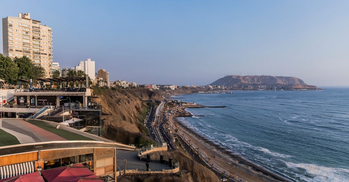 Explore the stunning coastal view of Miraflores, Lima, capturing the vibrant sea and cityscape.