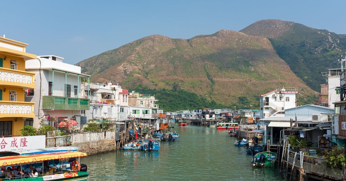 A Local-Pulse Travel Guide to Sham Shui Po, Hong Kong Charming view of Tai O Fishing Village with stilt houses and boats in New Territories, Hong Kong.