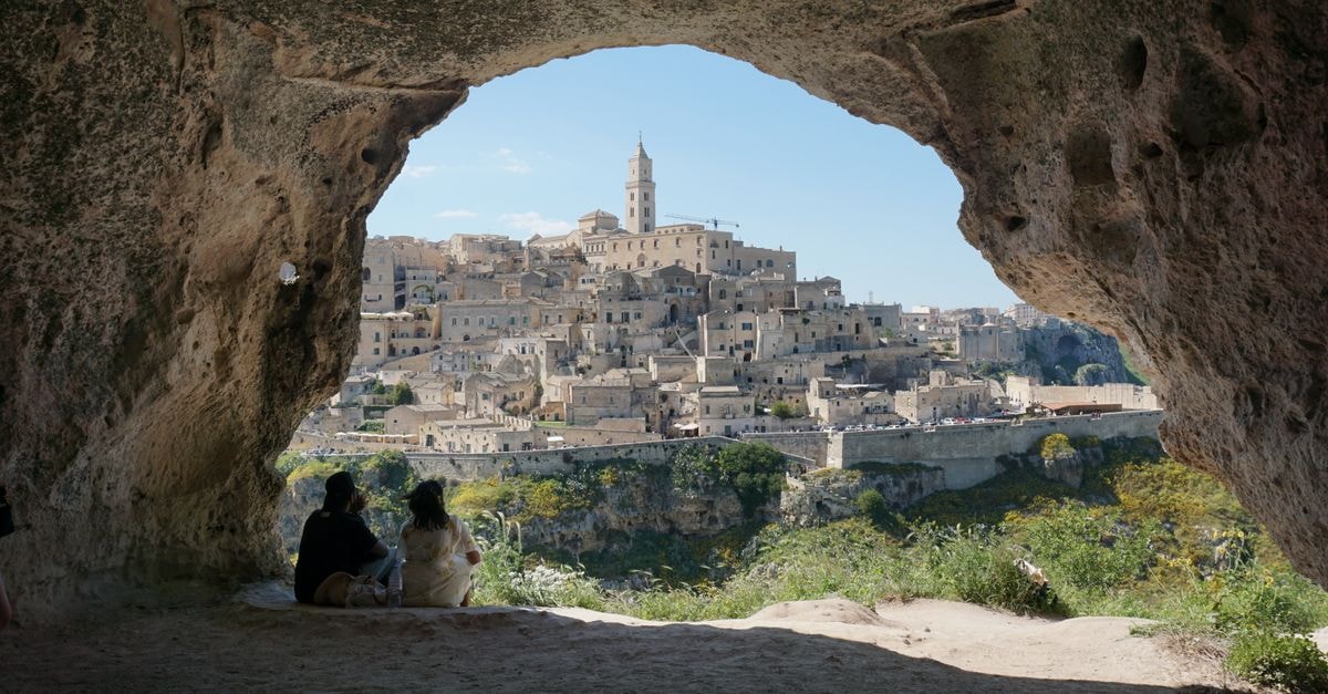 Captivating view of Matera, Italy from a cave, showcasing ancient architecture.