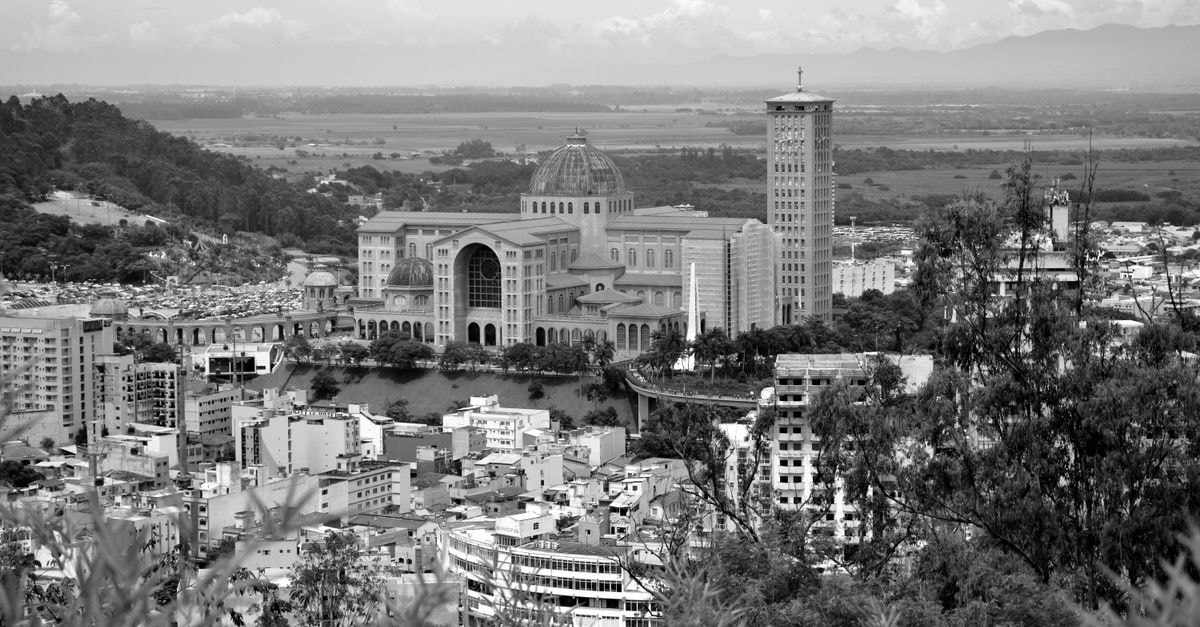Strassen Hotel in Aparecida de Goiânia: A Welcoming Stay Near the City Center Grayscale aerial view of Basilica of the National Shrine of Our Lady of Aparecida in São Paulo, Brazil.