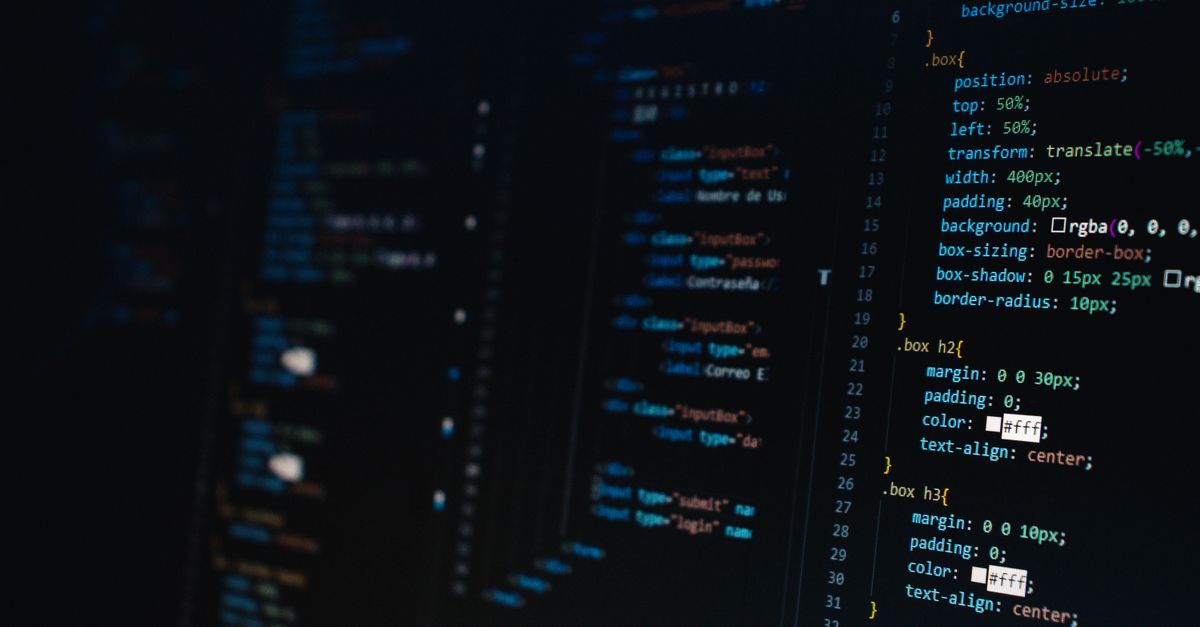 Zhipu AI's GLM-5 leads open-source rankings and aids US cybersecurity response Detailed view of HTML and CSS code on a dark screen, representing modern web development.