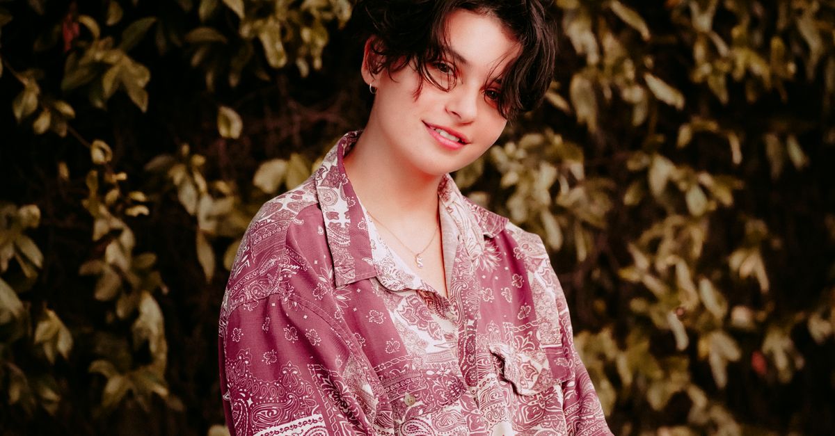 Broadway's Shoshana Bean teases tour special guests as WayV unveils 2026 'BORN' concert tour Charming portrait of a woman with a short hairstyle and printed shirt against a leafy background.