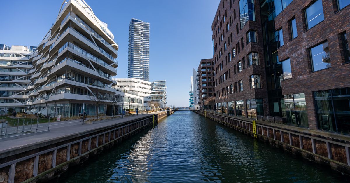 Aarhus on a Budget: A Practical July 2026 Travel Guide to Denmark's Second City Stunning view of modern architecture along a canal in Aarhus, Denmark.