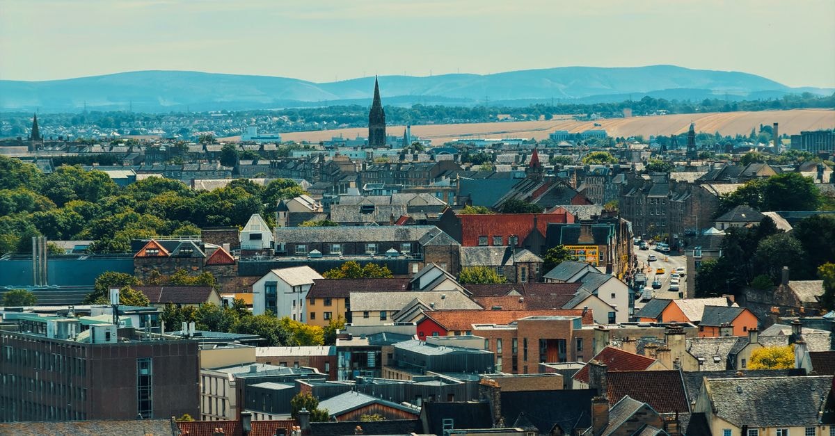 Dili Vanilli in Aileu: A Vanilla Farm Guesthouse on Estrada Aileu–Díli A scenic aerial view of Edinburgh, Scotland's charming rooftops and distant hills.