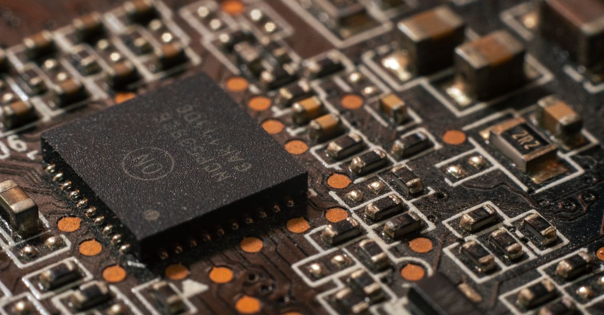 Broadcom signs $200 billion AI chip partnership with Samsung Electronics Detailed close-up of a computer circuit board showcasing electronic components.