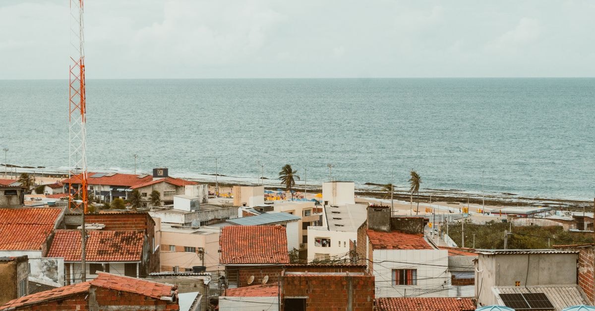 Jaboatao dos Guararapes Travel Guide: Coastal Pernambuco's Quiet Side Aerial view of Natal, RN, Brasil, showcasing red rooftops and Atlantic Ocean coastline.