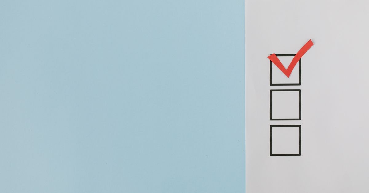 Anthropic Set to Add Citigroup to Top IPO Banks Ahead of Mega-Listing A minimalist checklist with a red checkmark on a blue background, providing ample copy space.