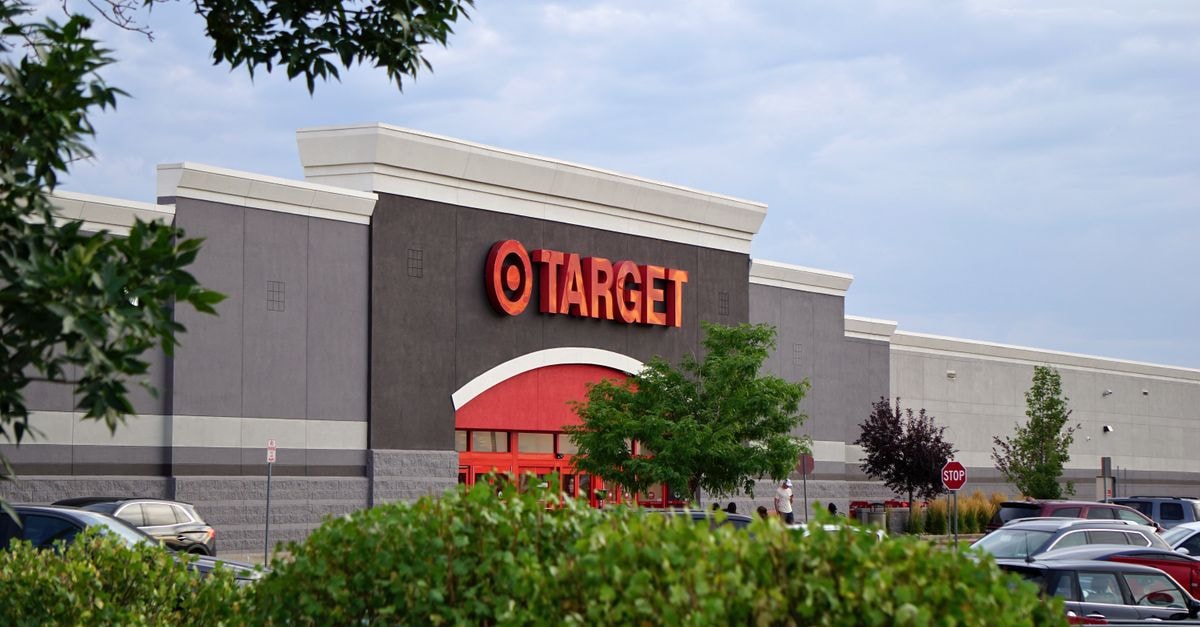 Target Corporation: Large Retailer With Real Estate, but Valuation Already Prices in Recovery View of a Target store with parking lot, featuring signage and greenery.