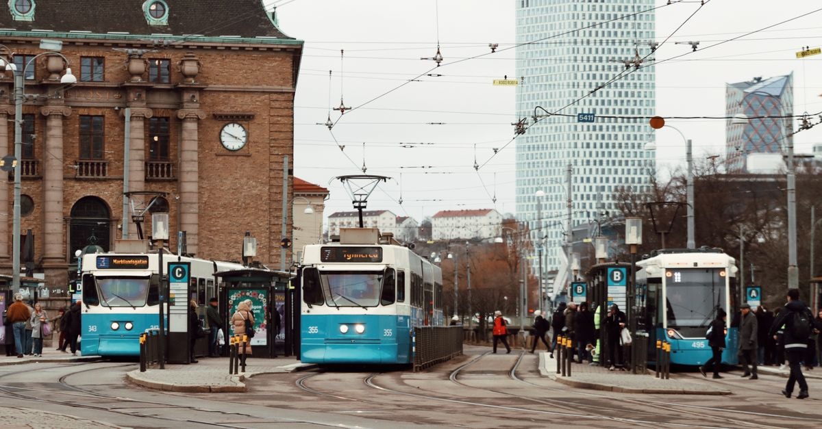 Trams at a busy intersection in Gothenburg city center, Sweden.