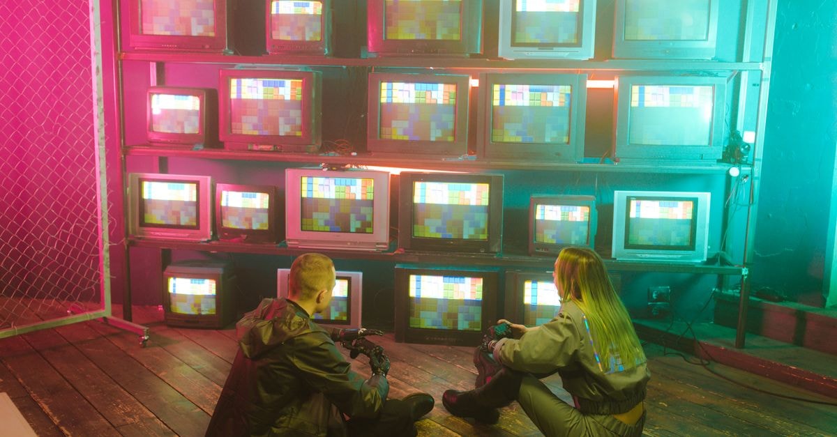 Nico Collins backs C.J. Stroud for breakout season as Texans target Bills in opener A cyberpunk inspired setting featuring two people with retro TVs displaying colorful test screens.
