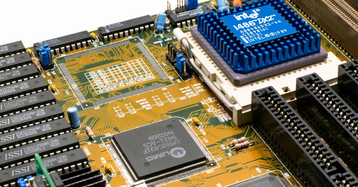 Intel lifts 2026 capex above US$20bn as Q2 revenue jumps 25% on AI CPU demand Detailed view of an Intel i486 DX2 CPU installed on a vintage motherboard with chips and circuits.