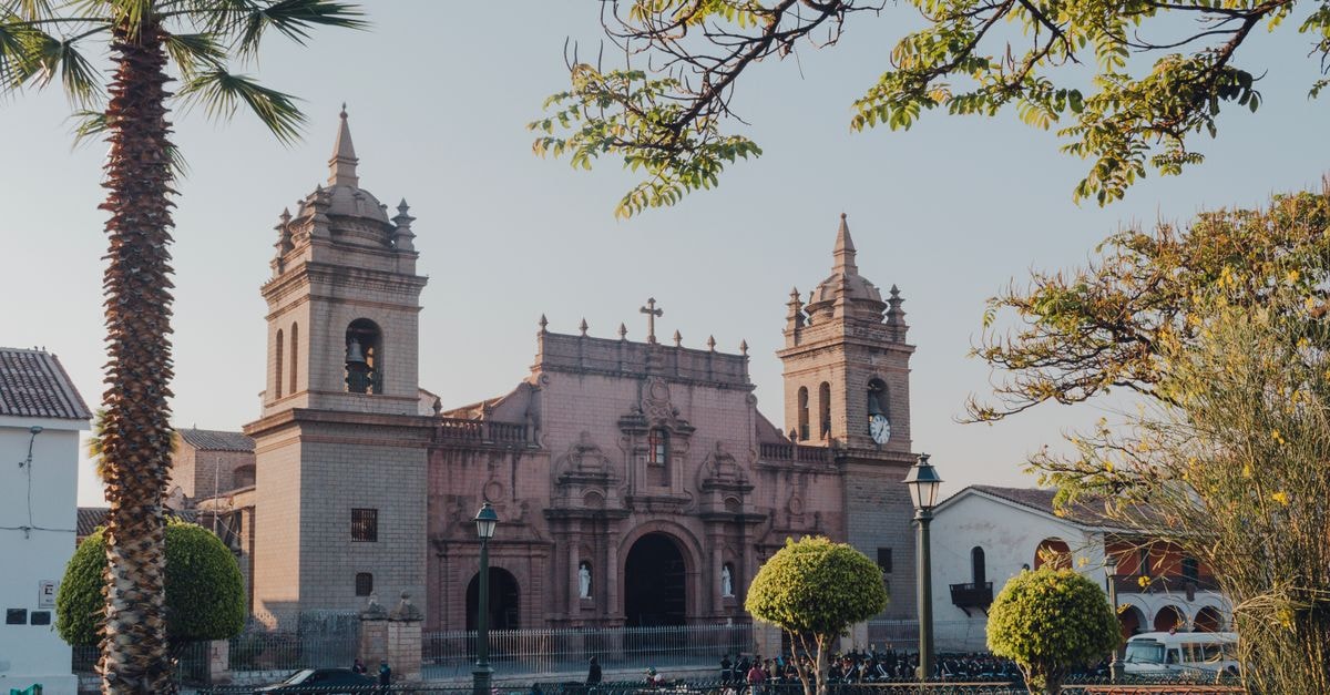 Ayacucho, Peru: a slow-travel guide to the Andean capital A scenic view of a historic cathedral in Ayacucho, Peru at daytime, showcasing architectural beauty.