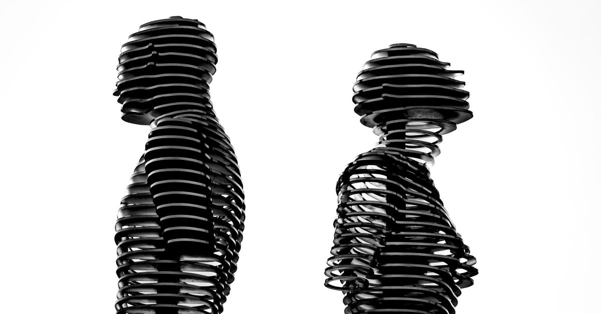 Chitungwiza Travel Guide: Sculptures, Sadza and Slow Wanders High-contrast abstract sculpture of two human figures in a silhouette form, conveying artistic expression.