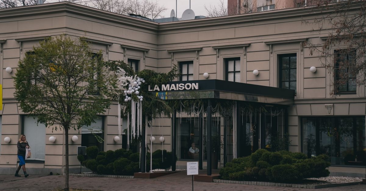 Kyiv travel guide: monuments, monasteries and slow mornings Street view of La Maison restaurant with decorations in Kyiv, Ukraine during early winter.