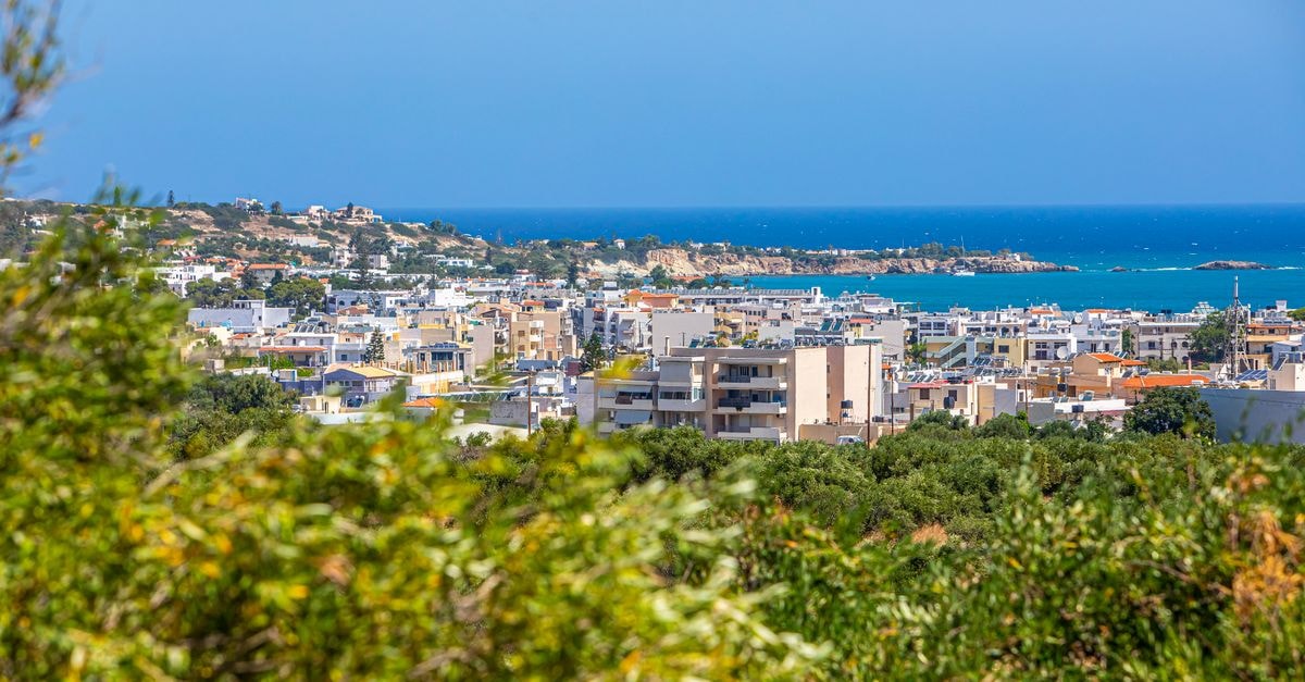 Hotel Kastro in Heraklion — A Cretan Hospitality Stay Inside the Old Town Bright day view of Heraklion city with the blue sea in the background, Crete, Greece.