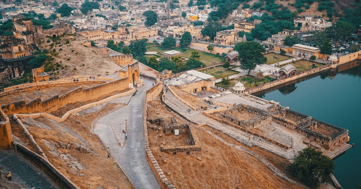 Joey's Hostel in Jaipur: A Backpacker Hub Near City Palace A stunning aerial shot of Amer Fort in Jaipur, showcasing historical architecture and scenic beauty.