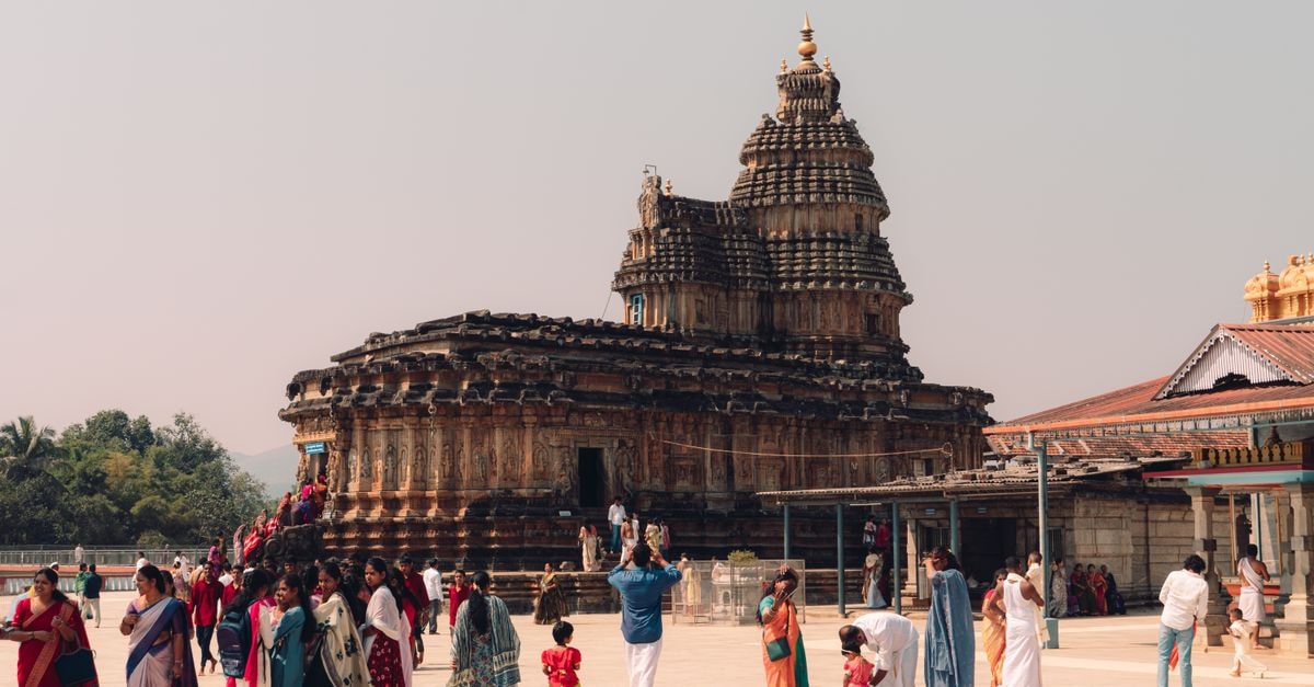 Hubballi Travel Guide: Slow Mornings and Temple Country Visitors explore the ancient Sringeri Temple in Karnataka, India, showcasing cultural heritage.