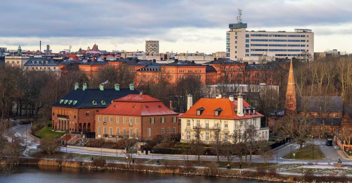 Scandic Pori in Pori: A Centrally Addressed Hotel on Itsenäisyydenkatu A picturesque view of Stockholm's historic architecture by the waterfront in winter.
