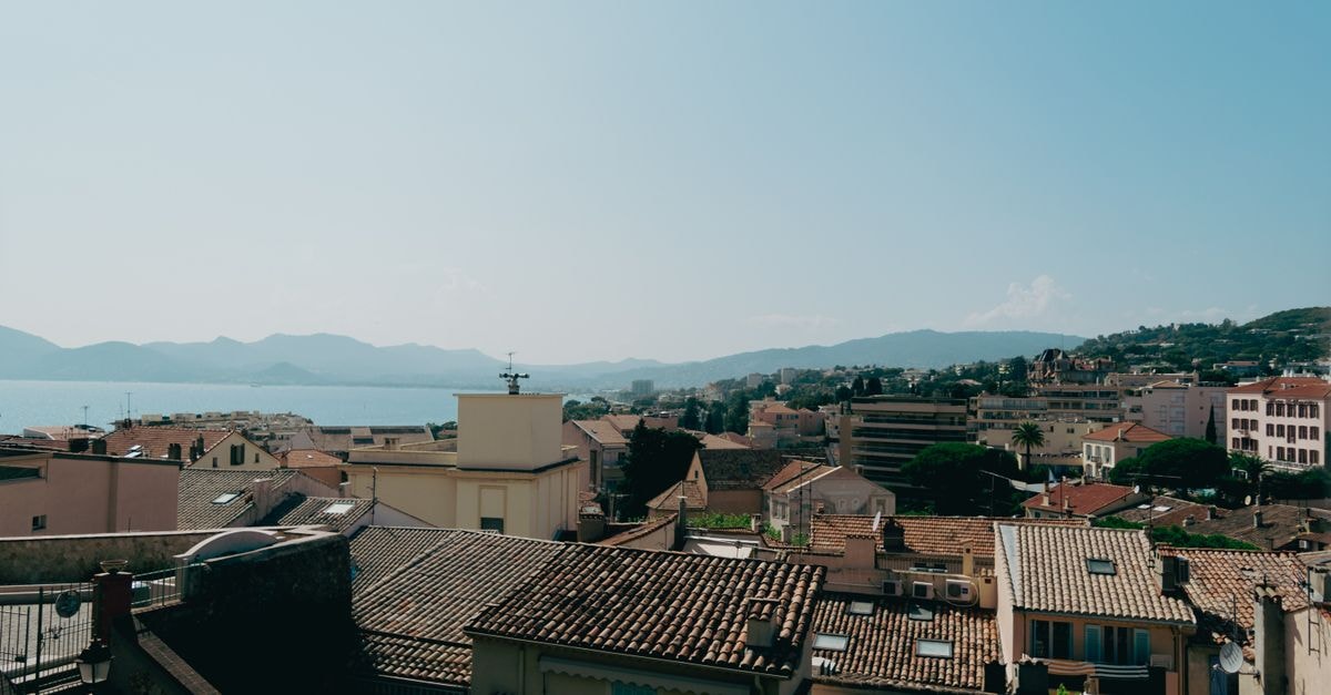 Résidence Kalliste, Ajaccio — Modern Aparthotel in the Pedestrian Heart of the Cité Impériale Stunning view over Cannes rooftops with the Mediterranean Sea in the background.