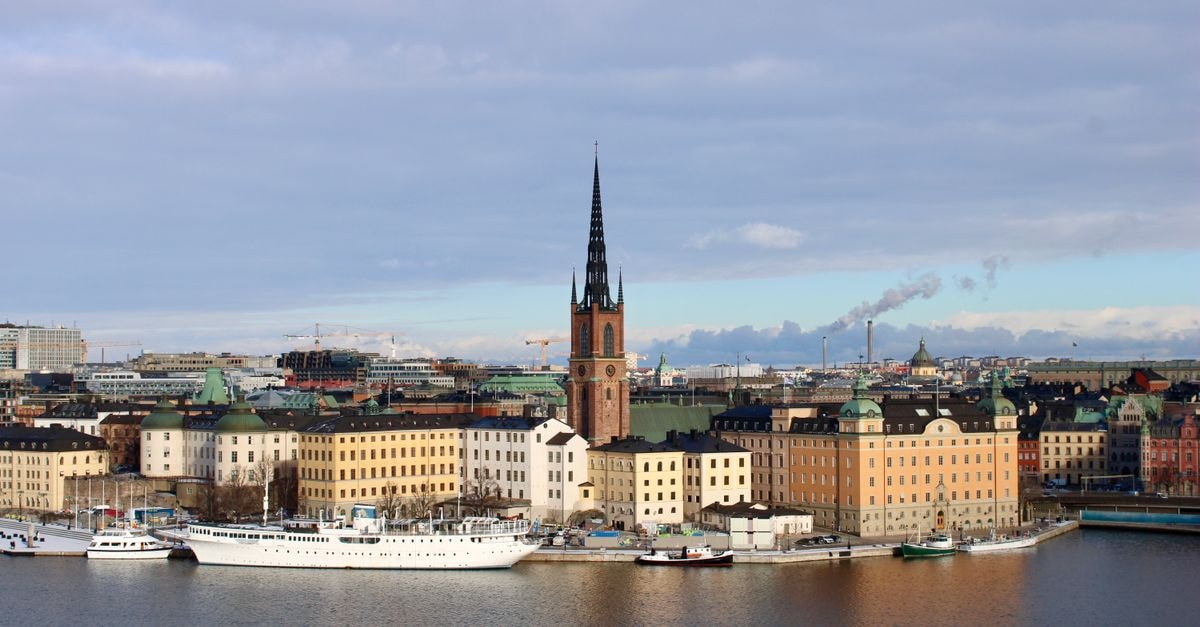 Quality Hotel Grand Steinkjer, Steinkjer — Modern Conference Hotel in the City Centre Scenic view of Riddarholmen Church and surrounding buildings by the Stockholm waterfront.